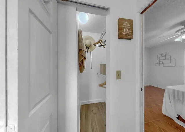 a bathroom with a shower and a sink