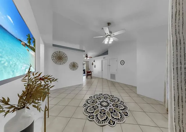 a view of an entryway with a chandelier