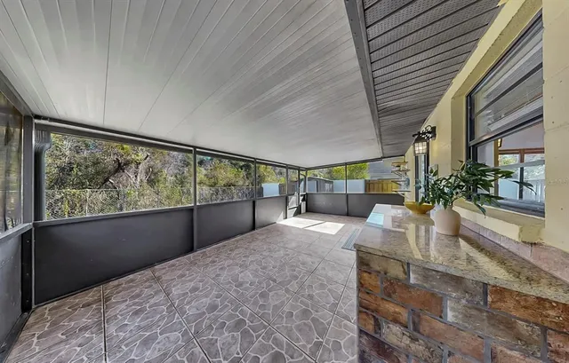 a view of a storage and utility room with washer and dryer
