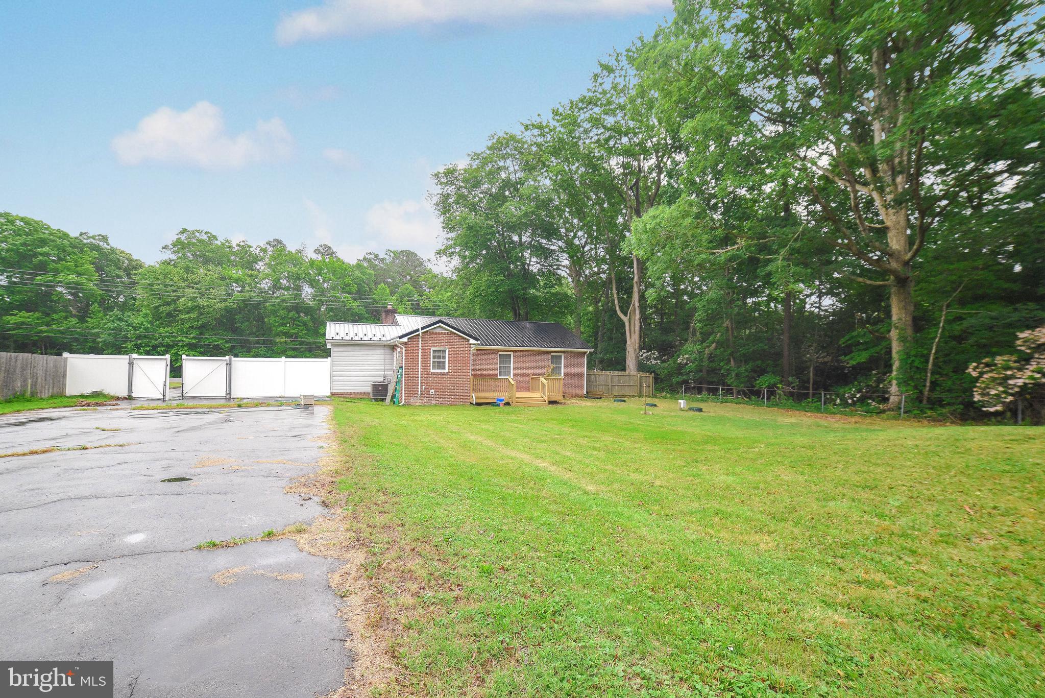 18997 Three Notch Road Lexington Park, MD 20653 - Photo 11 of 33 Paved storage. Camper or boat? No problem!