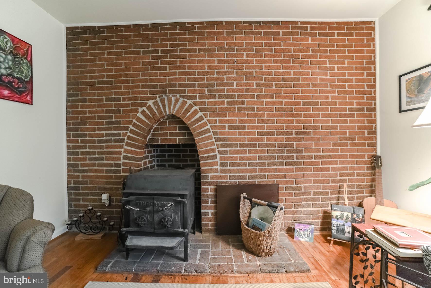 18997 Three Notch Road Lexington Park, MD 20653 - Photo 14 of 33 Warm the home with the wood stove