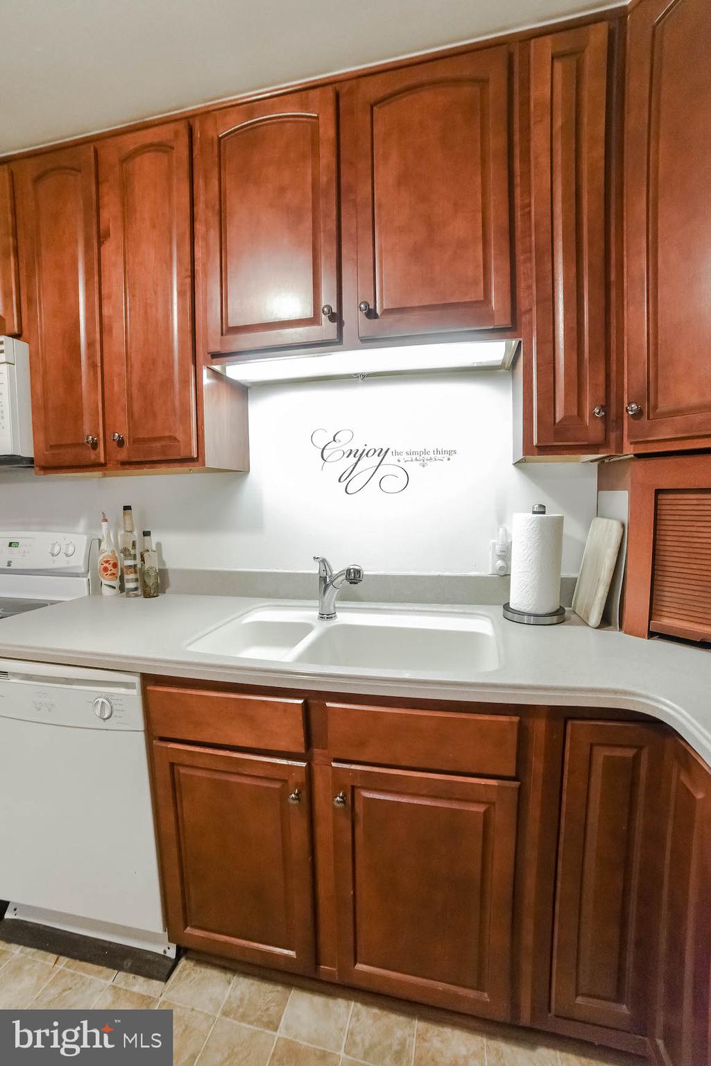 18997 Three Notch Road Lexington Park, MD 20653 - Photo 19 of 33 Smooth top stove and solid surface counters