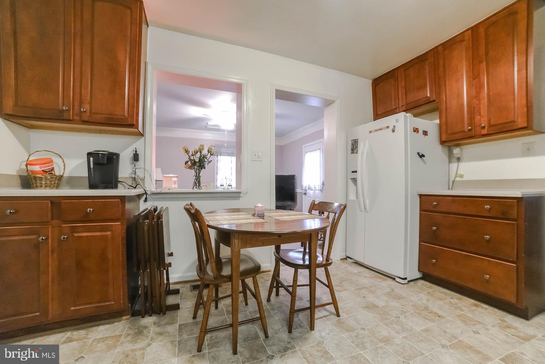 18997 Three Notch Road Lexington Park, MD 20653 - Photo 21 of 33 Kitchen opens to bonus room