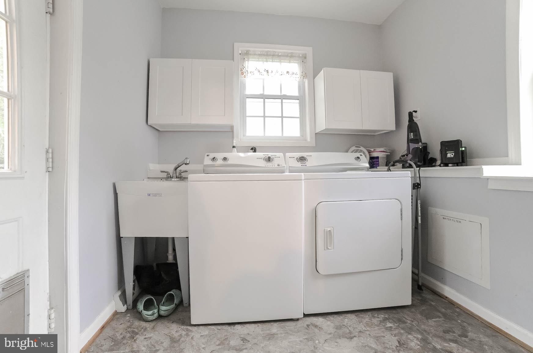 18997 Three Notch Road Lexington Park, MD 20653 - Photo 30 of 33 Good-size laundry room w/ storage and utility sink
