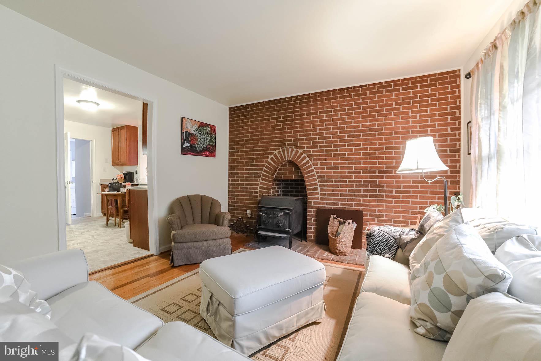 18997 Three Notch Road Lexington Park, MD 20653 - Photo 4 of 33 Brick accent wall