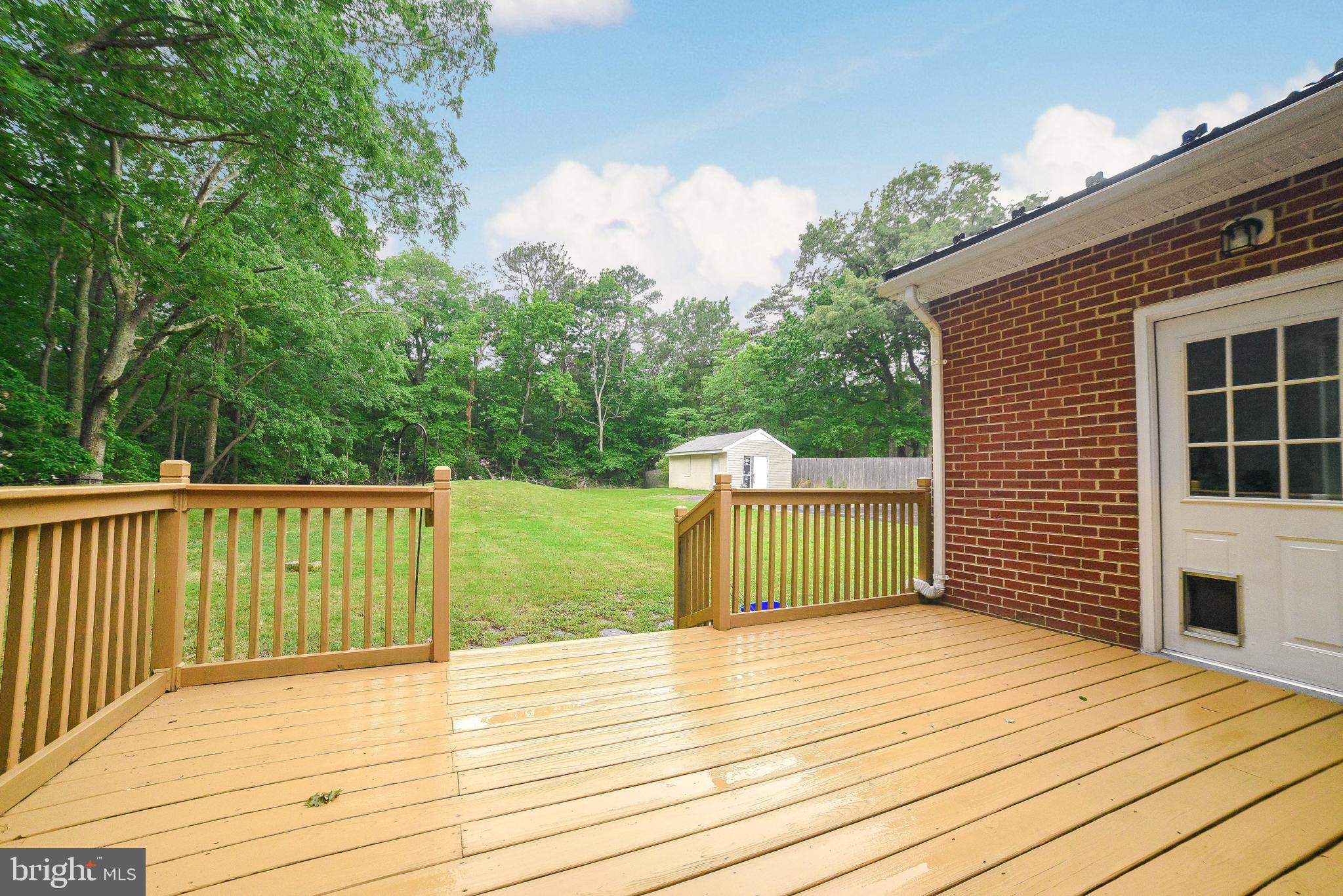 18997 Three Notch Road Lexington Park, MD 20653 - Photo 8 of 33 Enjoy the privacy of the freshly-stained back deck