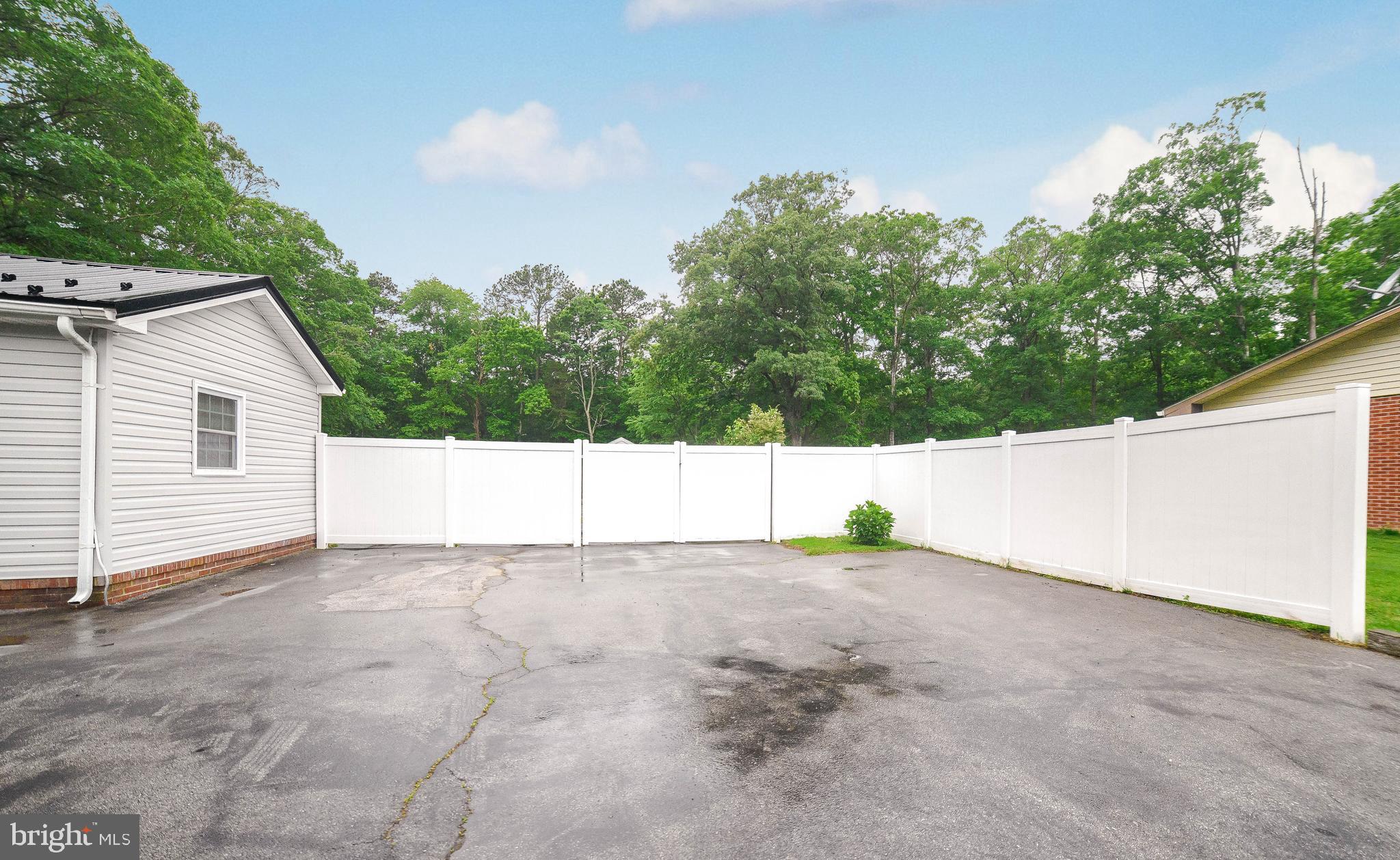 18997 Three Notch Road Lexington Park, MD 20653 - Photo 10 of 33 Extra parking and gate to back