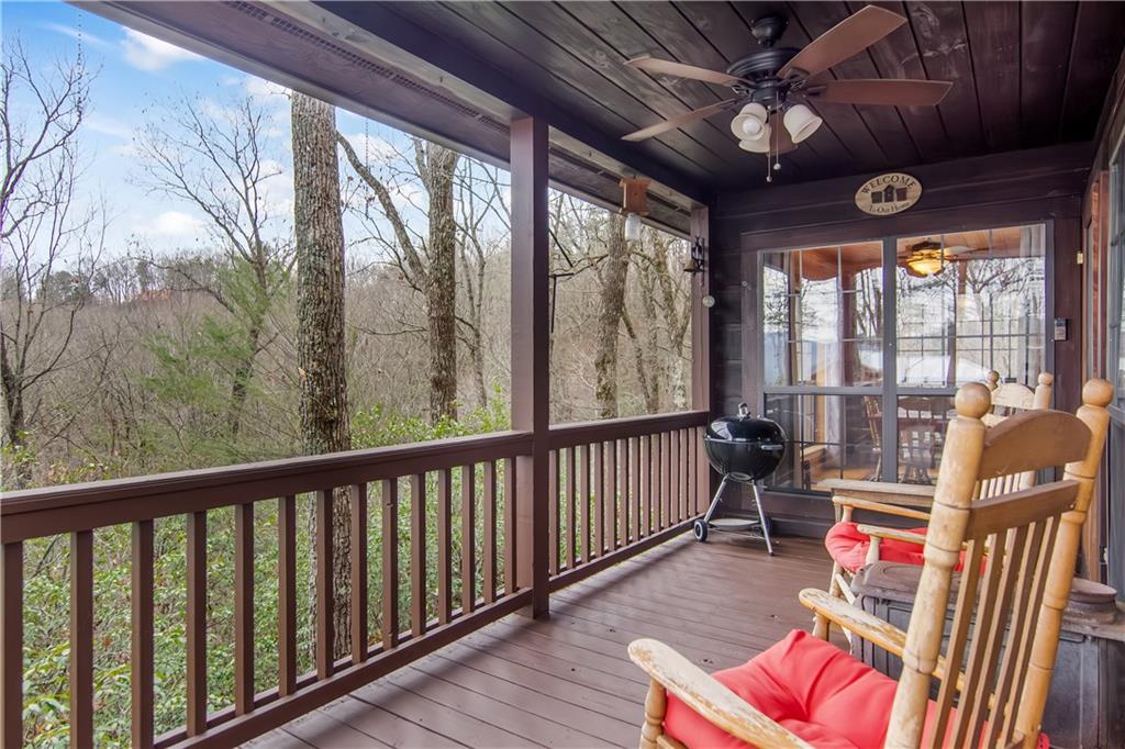 152 Broken Arrow Path Blue Ridge, GA 30513 - Photo 12 of 50 a view of a porch with furniture