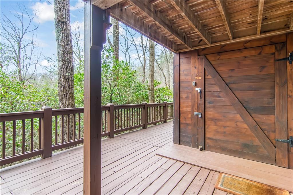 152 Broken Arrow Path Blue Ridge, GA 30513 - Photo 5 of 50 a view of balcony with wooden floor