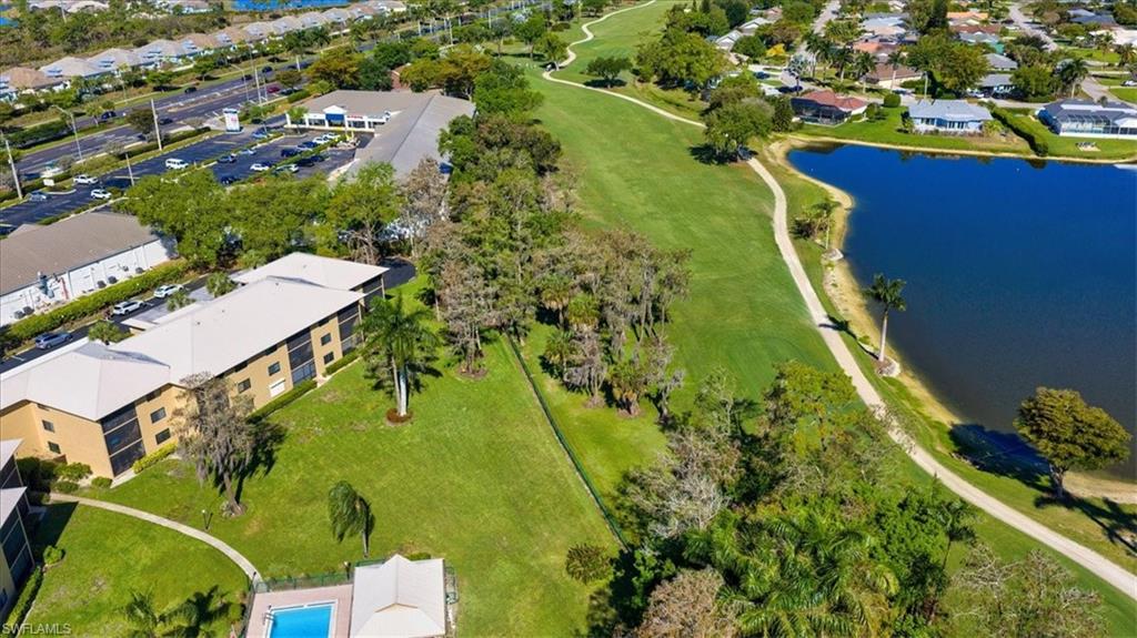 75 St Andrews Boulevard, Unit C301 Naples, FL 34113 - Photo 38 of 41 an aerial view of residential houses with outdoor space