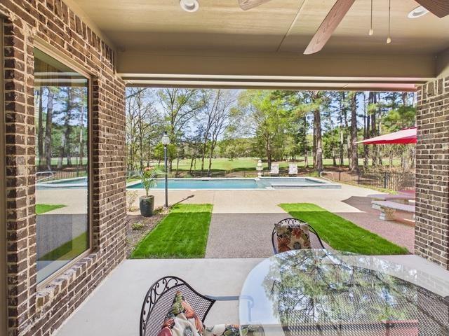 8550 Toler Pointe Larue, TX 75770 - Photo 18 of 37 a view of a porch with a backyard