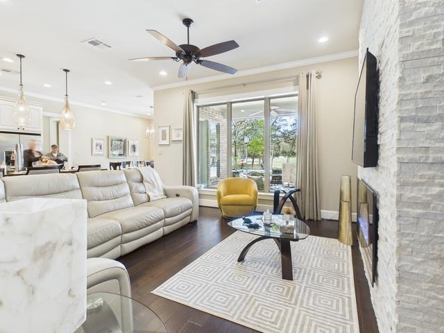 8550 Toler Pointe Larue, TX 75770 - Photo 21 of 37 a living room with furniture a large window and a chandelier