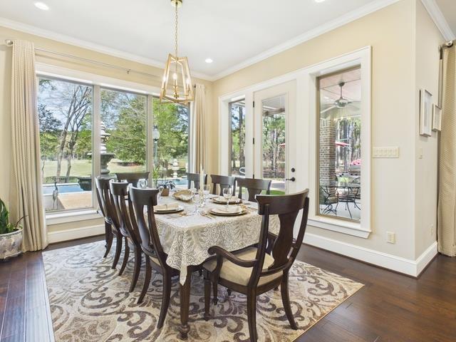 8550 Toler Pointe Larue, TX 75770 - Photo 28 of 37 a dining room with furniture window wooden floor