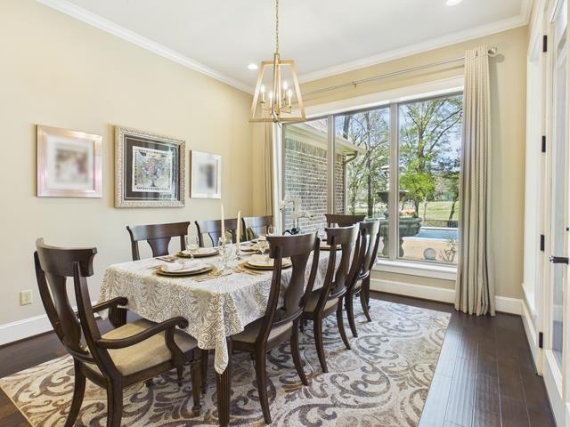 8550 Toler Pointe Larue, TX 75770 - Photo 30 of 37 a view of a dining room with furniture window and wooden floor