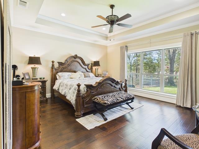 8550 Toler Pointe Larue, TX 75770 - Photo 31 of 37 a bed sitting in a room next to a window