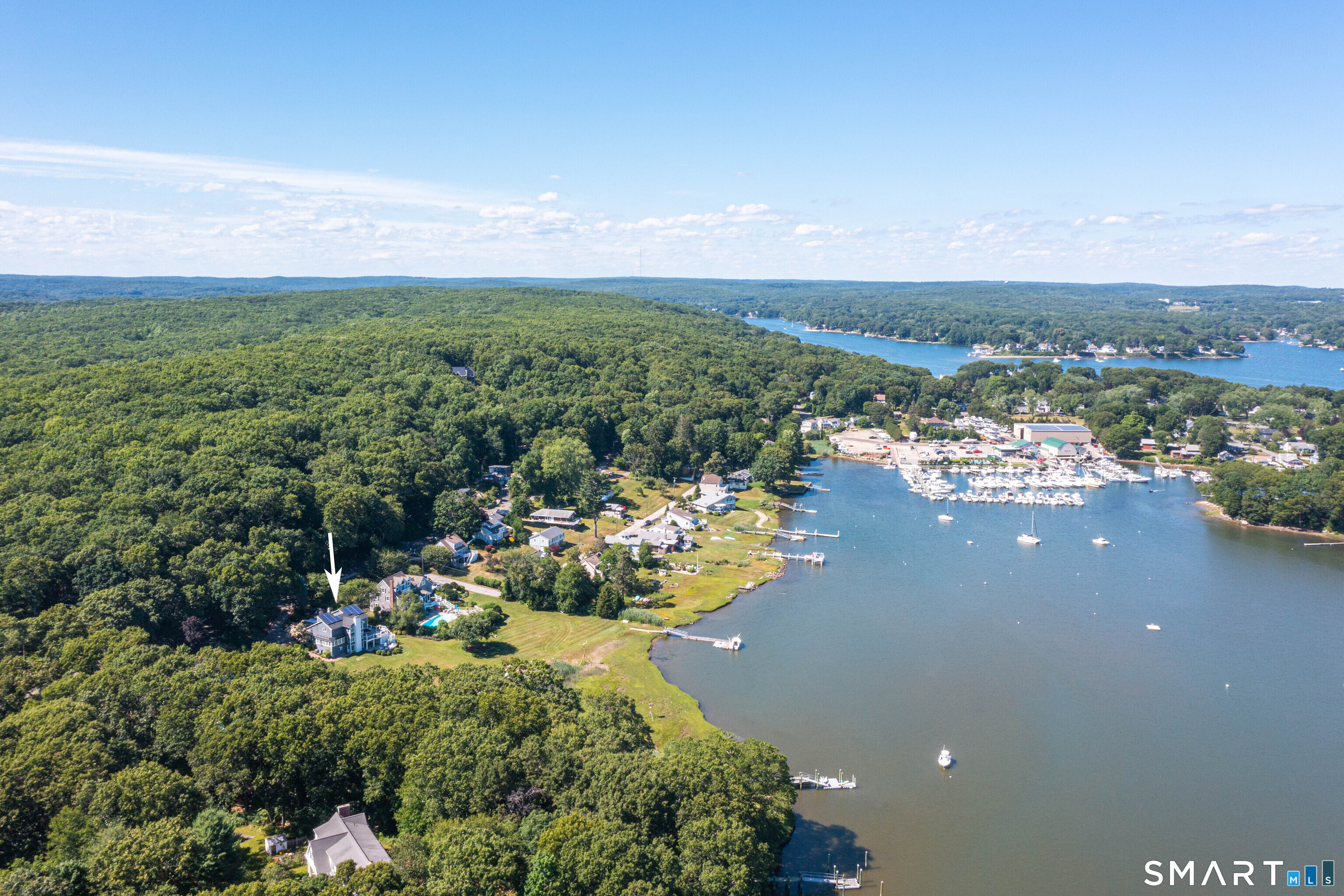 47 Oswegatchie Hills Road East Lyme, CT 06357 - Photo 22 of 40 a view of a city with lots of green space