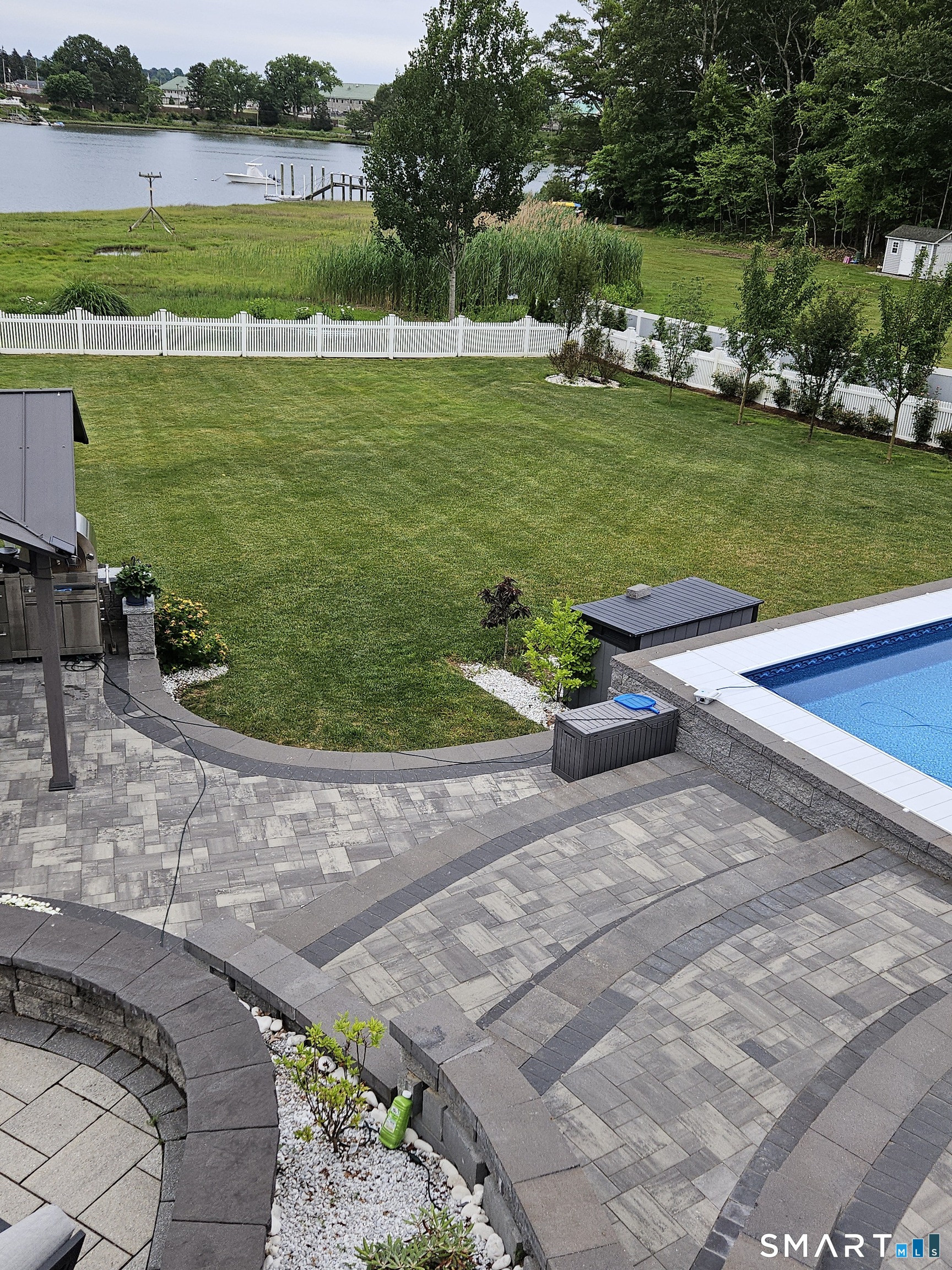 47 Oswegatchie Hills Road East Lyme, CT 06357 - Photo 31 of 40 a view of a golf course with a lake