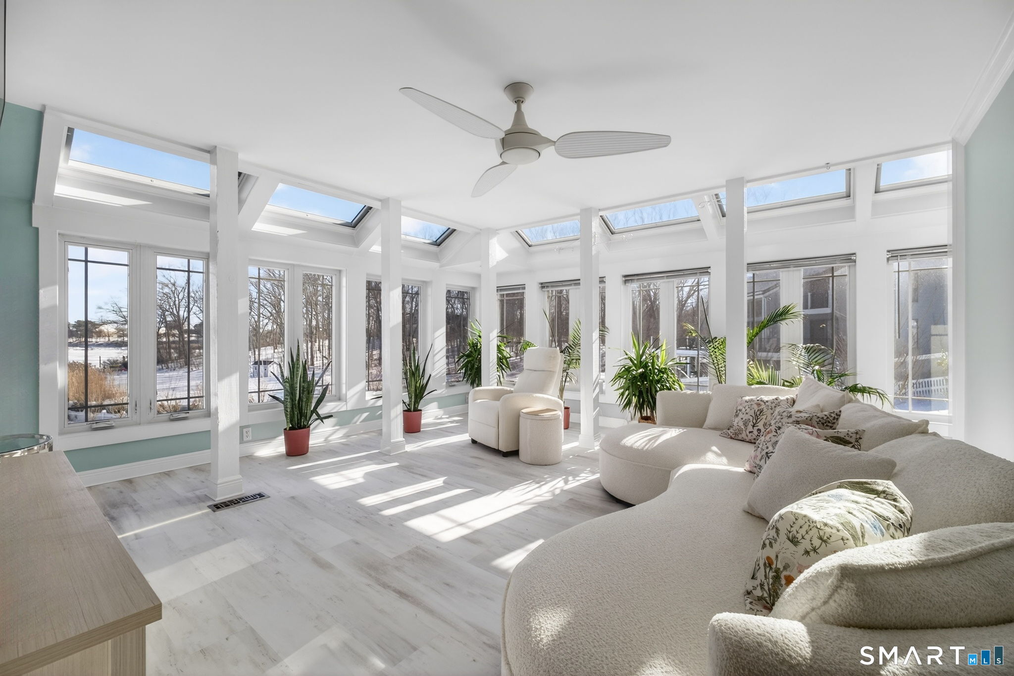 47 Oswegatchie Hills Road East Lyme, CT 06357 - Photo 5 of 40 a living room with furniture and a large window
