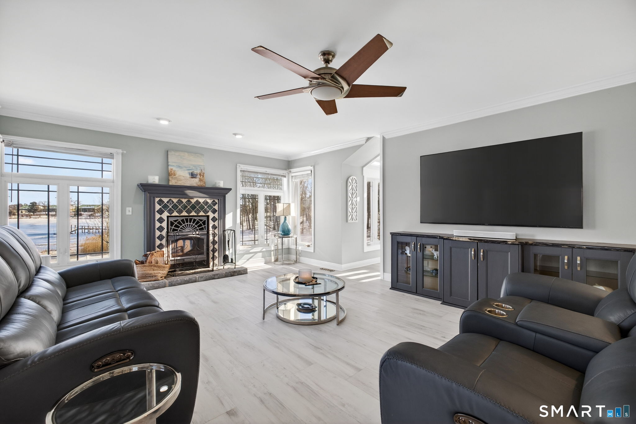 47 Oswegatchie Hills Road East Lyme, CT 06357 - Photo 7 of 40 a living room with furniture and a flat screen tv