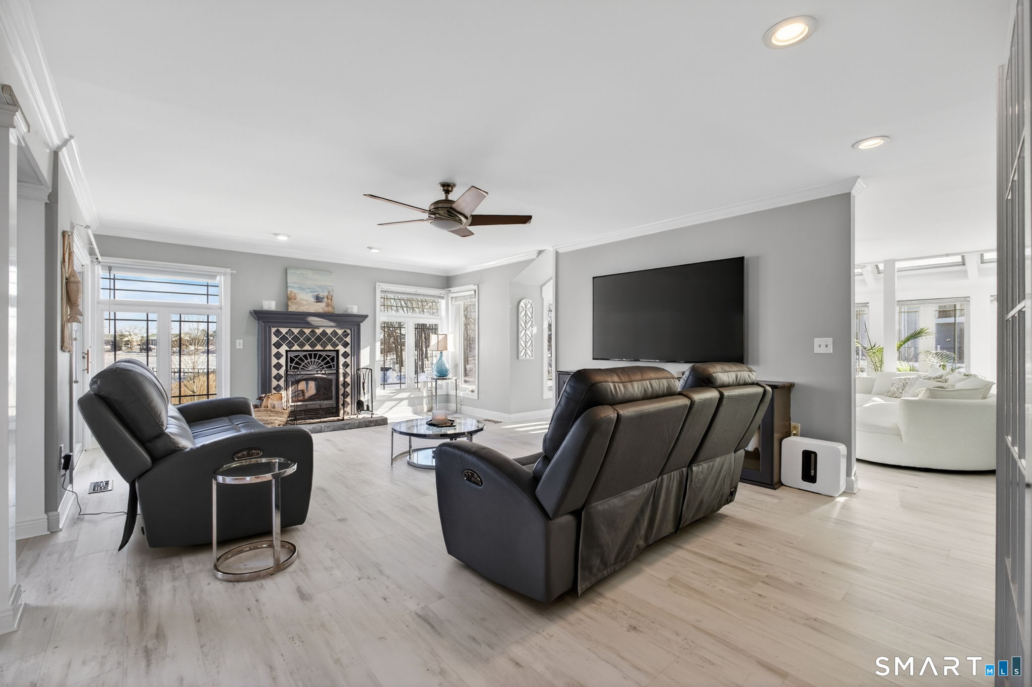 47 Oswegatchie Hills Road East Lyme, CT 06357 - Photo 8 of 40 a living room with furniture and a flat screen tv