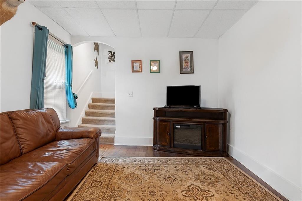 288 Bascom Avenue Pittsburgh, PA 15214 - Photo 17 of 32 a living room with furniture and a flat screen tv
