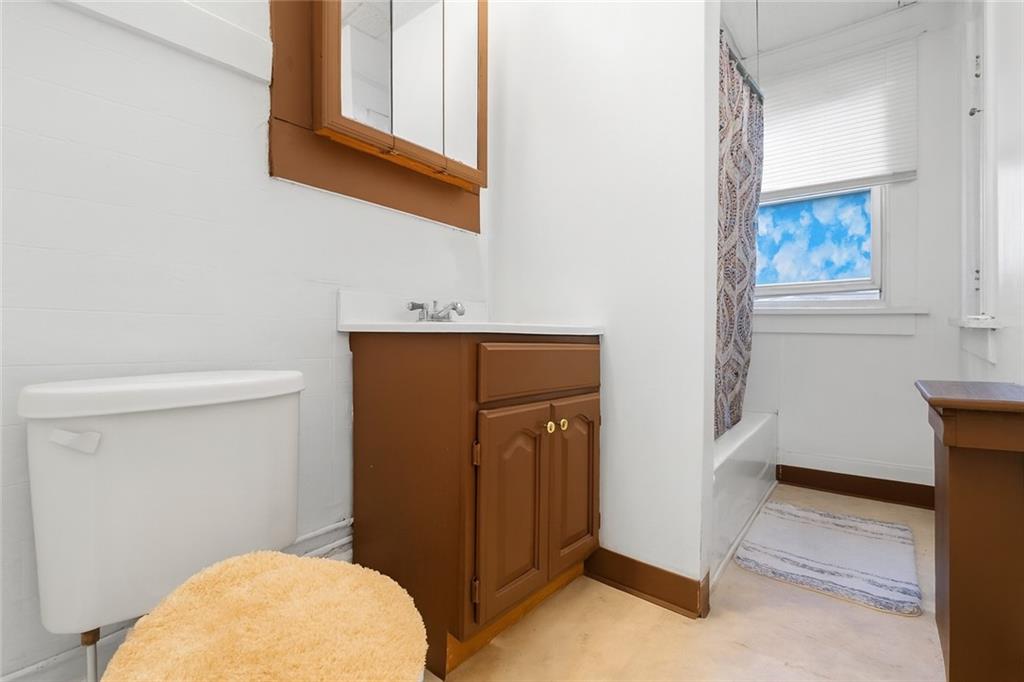 288 Bascom Avenue Pittsburgh, PA 15214 - Photo 21 of 32 a bathroom with a sink and a mirror