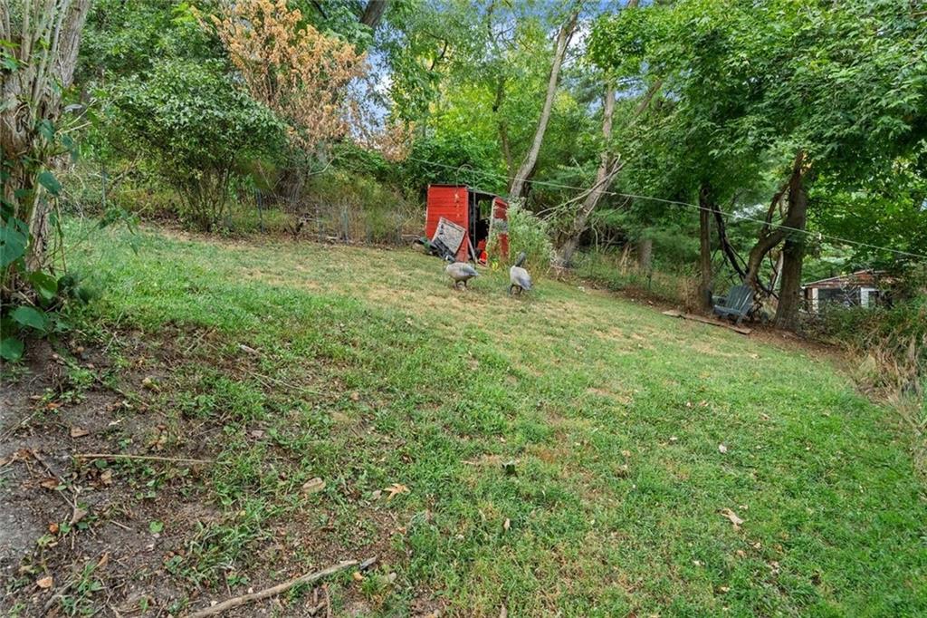 288 Bascom Avenue Pittsburgh, PA 15214 - Photo 27 of 32 a view of a green field with trees in the background