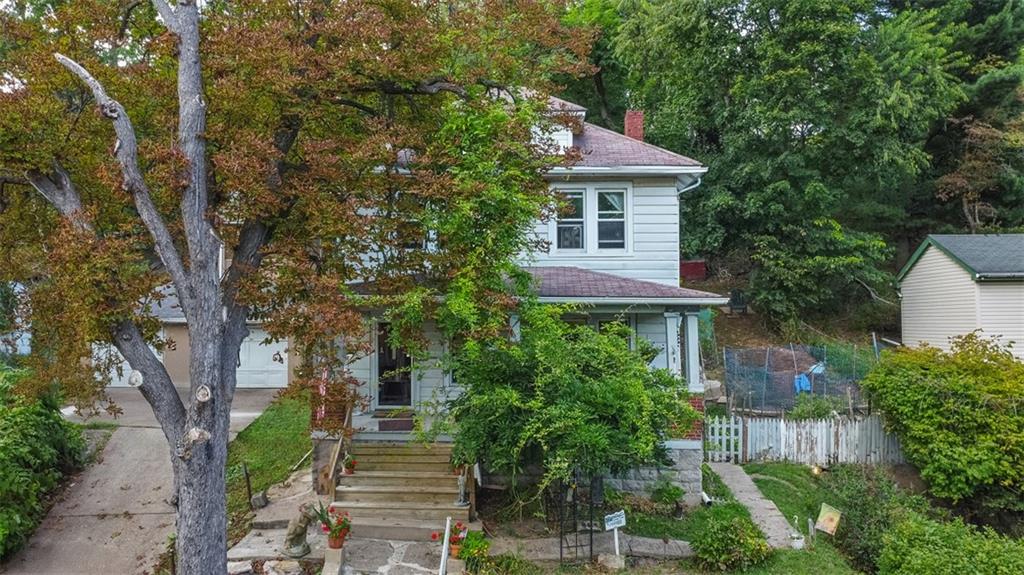 288 Bascom Avenue Pittsburgh, PA 15214 - Photo 32 of 32 a front view of a house with a yard and tree s