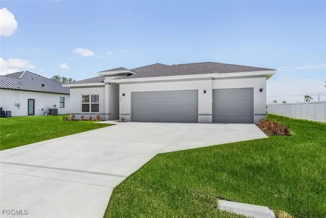 a front view of house with yard