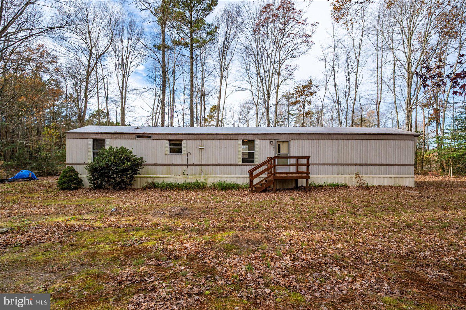 729 Snow Hill Road Stockton, MD 21864 - Photo 37 of 46 a view of a house with a yard