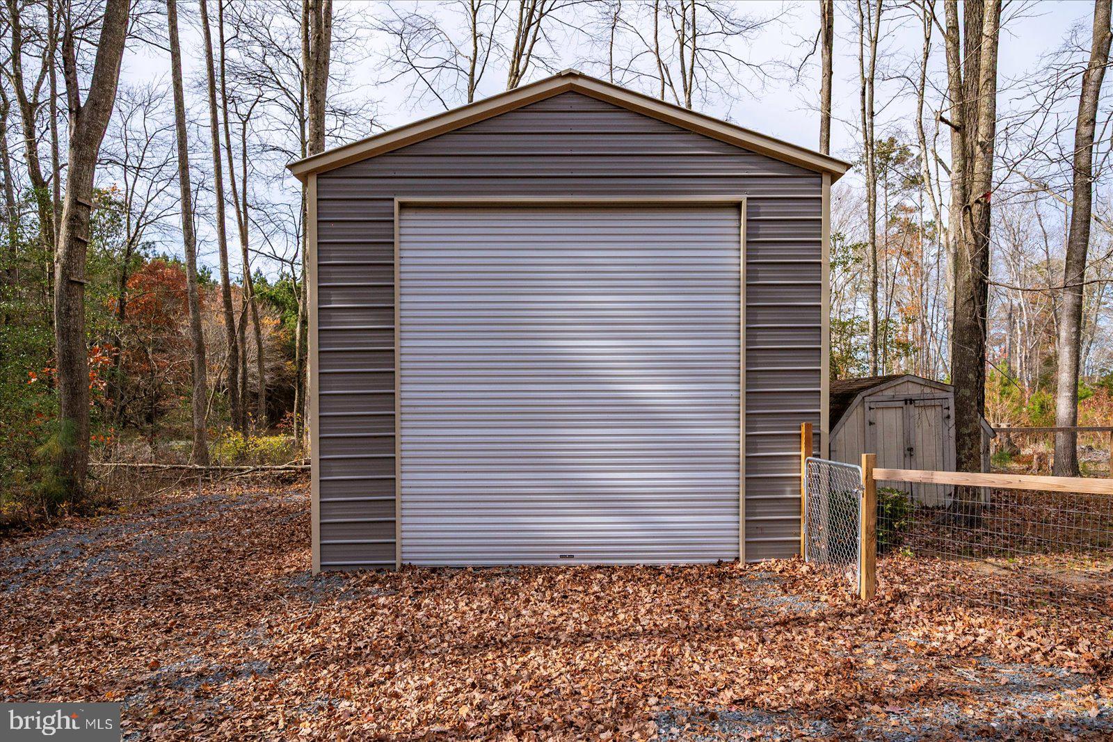729 Snow Hill Road Stockton, MD 21864 - Photo 44 of 46 a view of a house with a yard