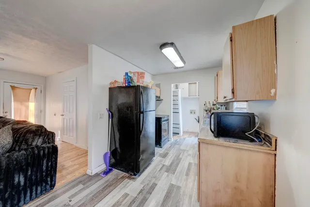 a view of a living room and a flat screen tv