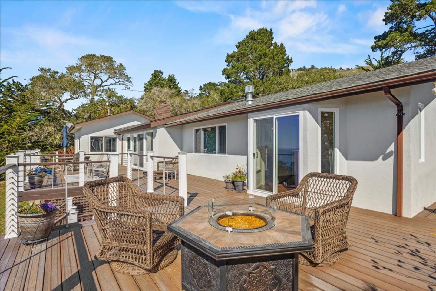 15 Mentone Road Carmel, CA 93923 - Photo 36 of 47 a view of a patio with a table chairs and a potted plant