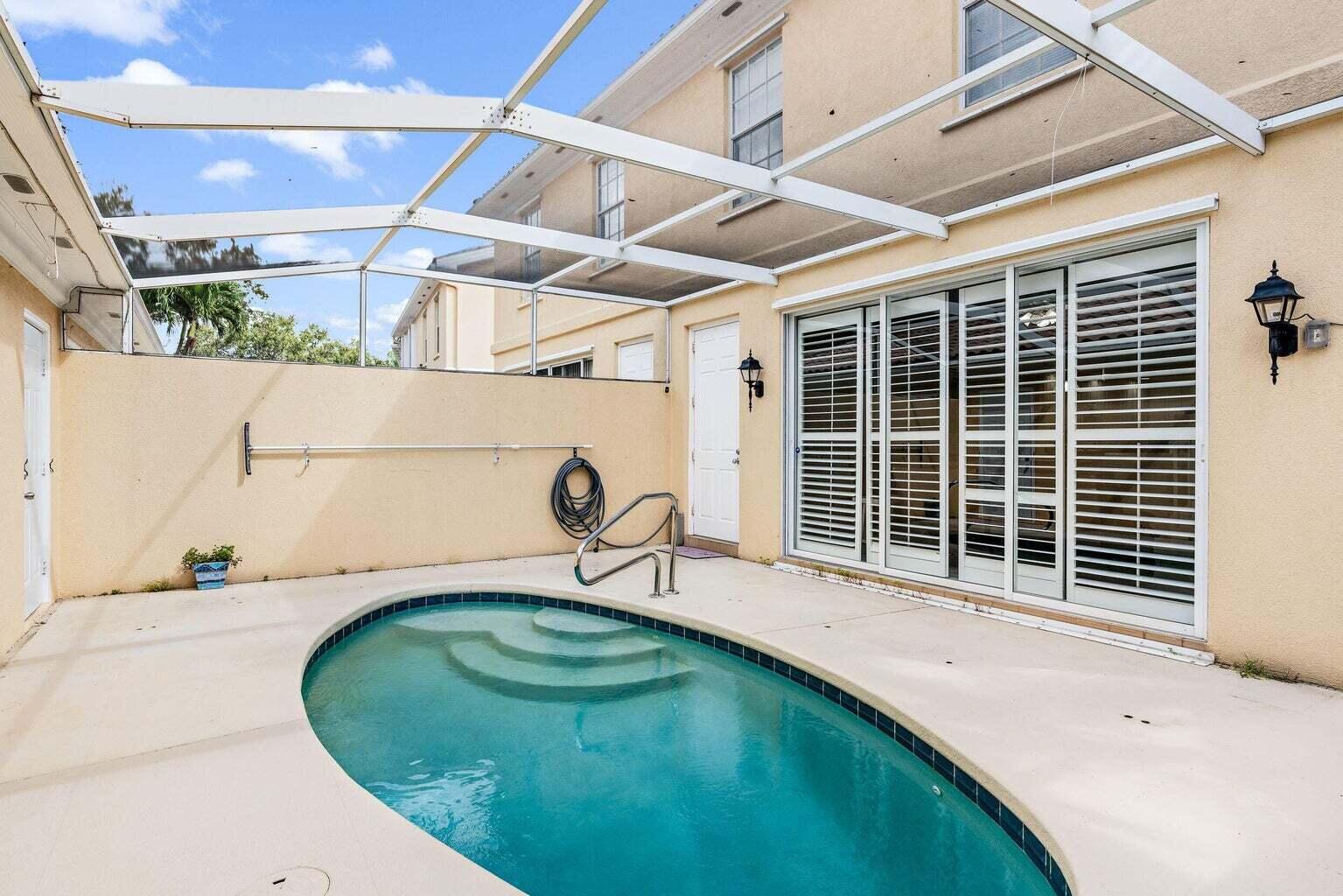 4030 Parkside Drive Jupiter, FL 33458 - Photo 2 of 26 a view of a backyard