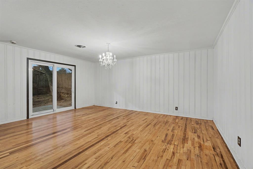 1714 East Union Bower Road Irving, TX 75061 - Photo 14 of 32 a view of an empty room with wooden floor