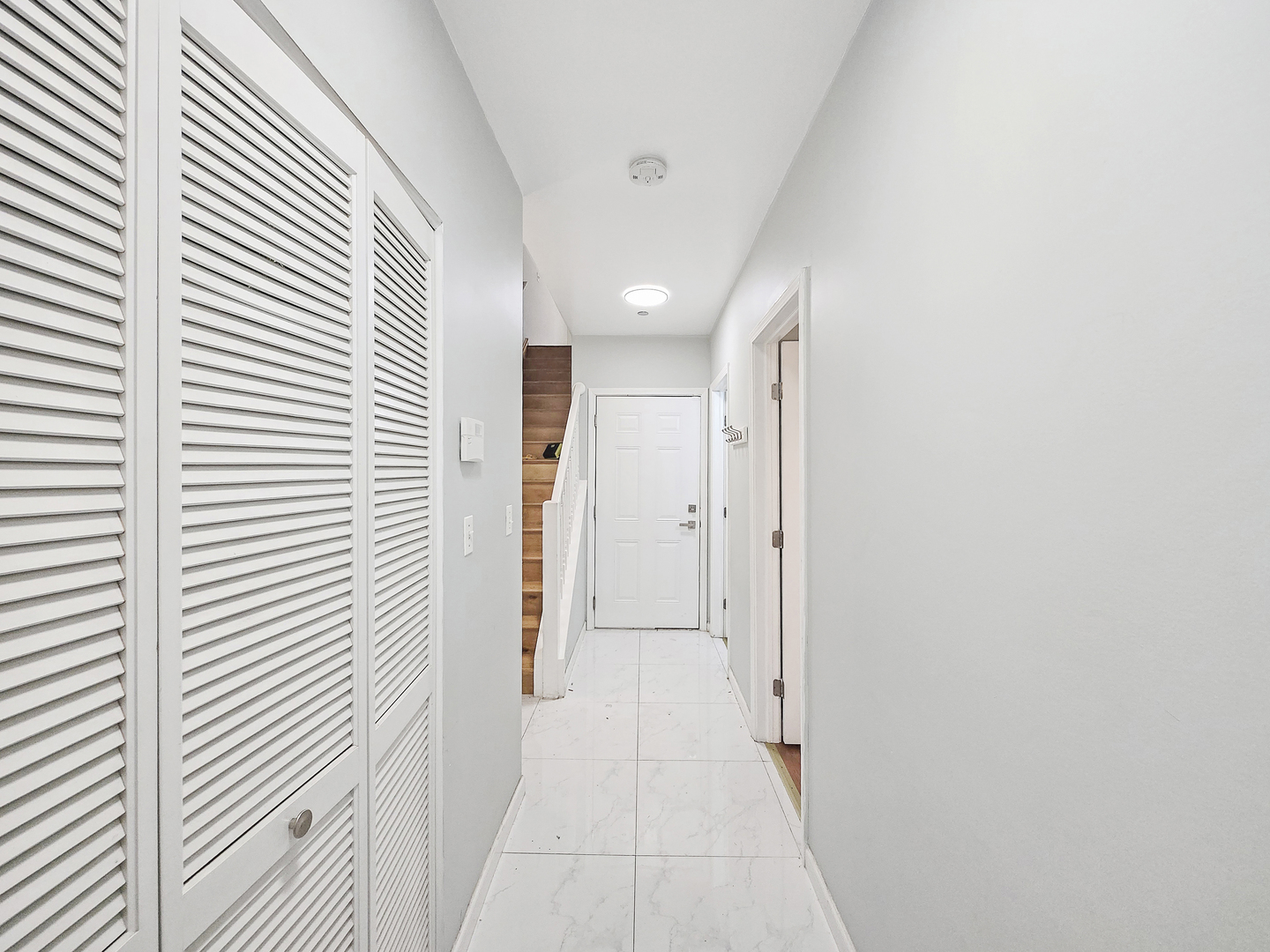 2415 West 32nd Place Chicago, IL 60608 - Photo 13 of 25 a view of a hallway with a window