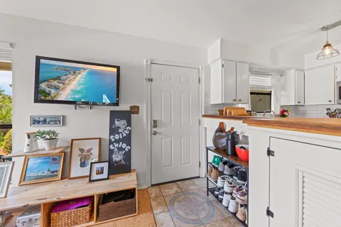 a living room with lots of furniture and decor