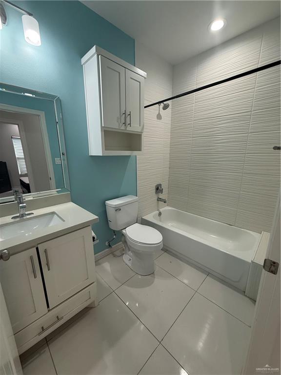 204 West Rutherford Avenue, Unit 4 Edinburg, TX 78541 - Photo 6 of 12 a bathroom with a toilet sink and mirror