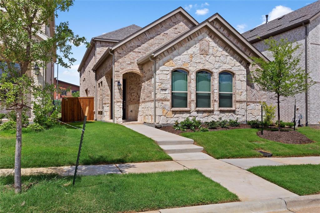 175 Mccartt Drive Lewisville, TX 75067 - Photo 1 of 22 French country inspired facade featuring stone siding