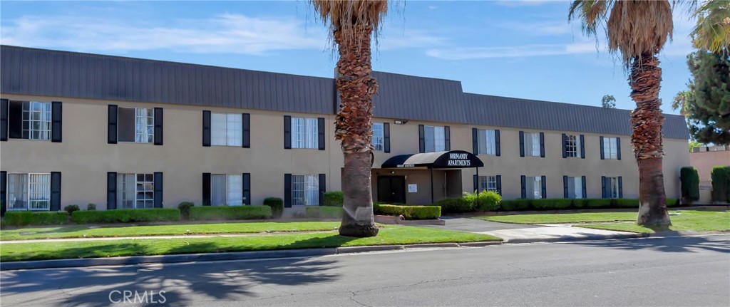 1480 Seventh Street Riverside, CA 92507 - Photo 1 of 7 a front view of a building with a garden and trees