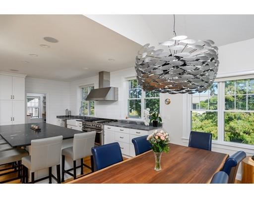 48 Marion Road Scituate, MA 02066 - Photo 12 of 33 a view of a dining room with furniture window and outside view