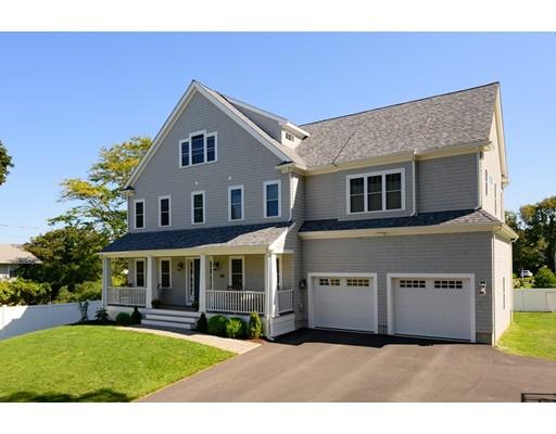 48 Marion Road Scituate, MA 02066 - Photo 2 of 33 a front view of a house with a yard