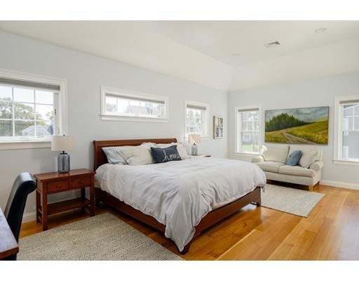 48 Marion Road Scituate, MA 02066 - Photo 21 of 33 a bedroom with a bed and a couch