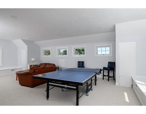 48 Marion Road Scituate, MA 02066 - Photo 26 of 33 a living room with furniture and a table