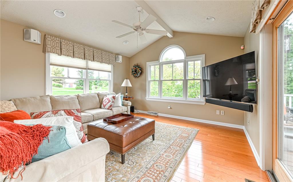 123 Weybridge Road Gibsonia, PA 15044 - Photo 11 of 25 a living room with furniture and a flat screen tv