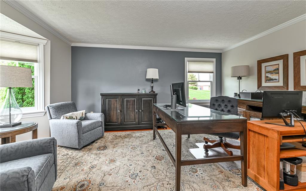 123 Weybridge Road Gibsonia, PA 15044 - Photo 13 of 25 a living room with furniture and a window
