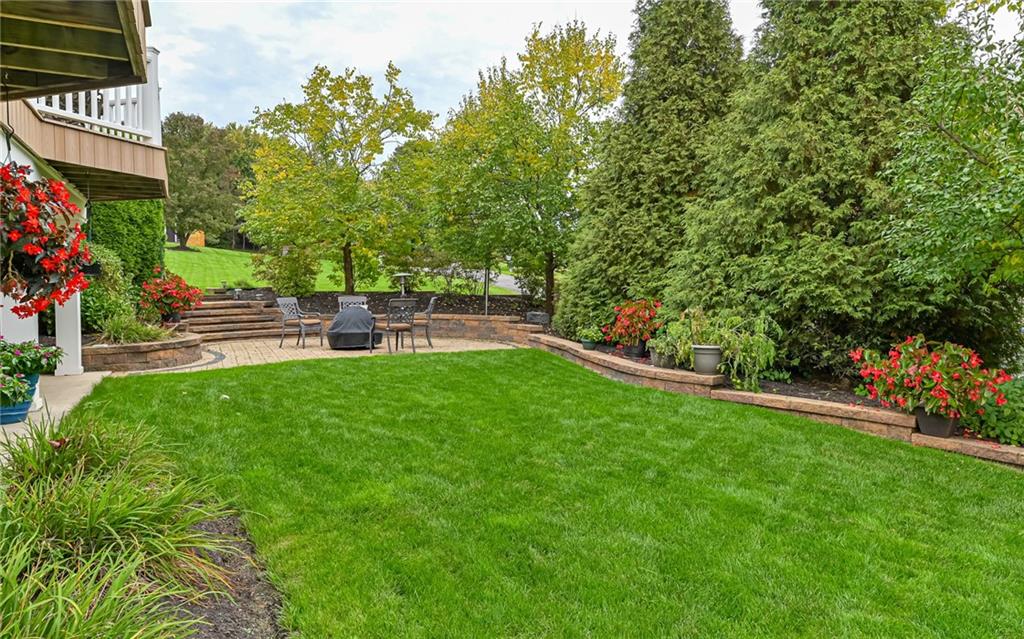 123 Weybridge Road Gibsonia, PA 15044 - Photo 21 of 25 a view of yard with grass and flowers