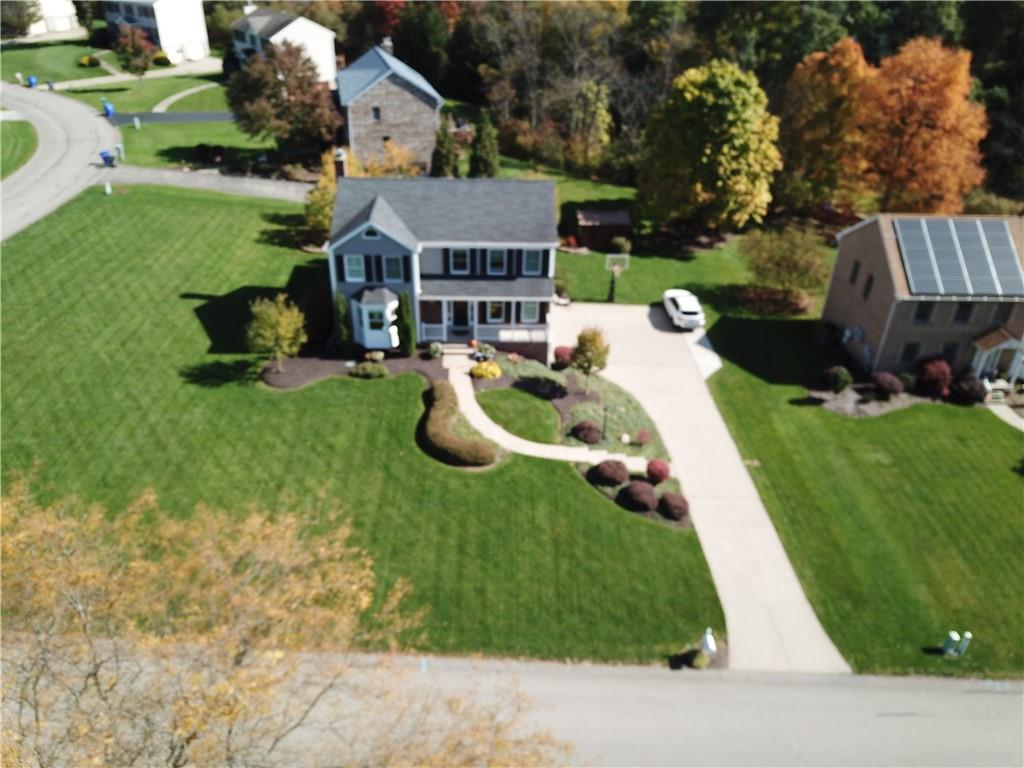 123 Weybridge Road Gibsonia, PA 15044 - Photo 23 of 25 an aerial view of a house with swimming pool garden and patio