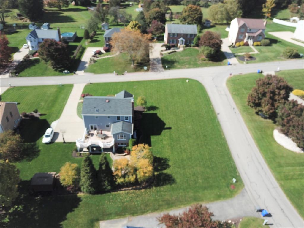 123 Weybridge Road Gibsonia, PA 15044 - Photo 24 of 25 an aerial view of a house with a garden and swimming pool