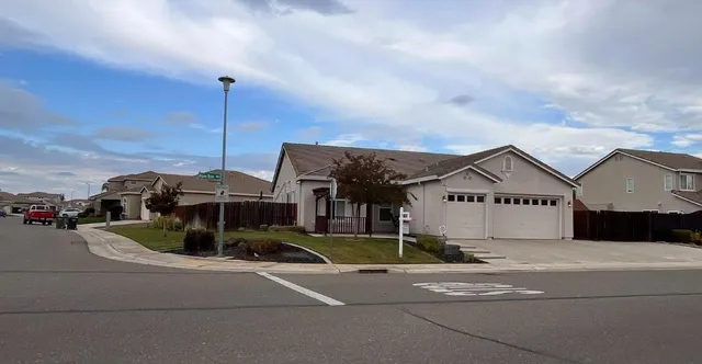 a view of a street in front of house